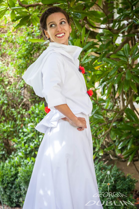 Model wearing GinD waterproof ensemble, wedding jacket and skirt